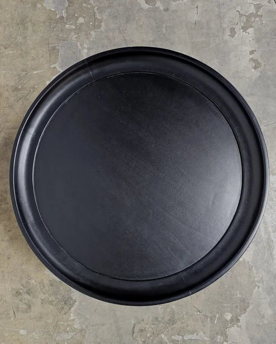 Round coffee table in mango wood with black finish