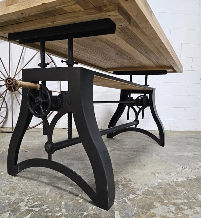 Crank dining table with matt black steel base and natural mango wood top