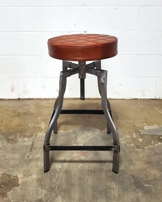 Adjustable leather counter stool with black or raw steel base