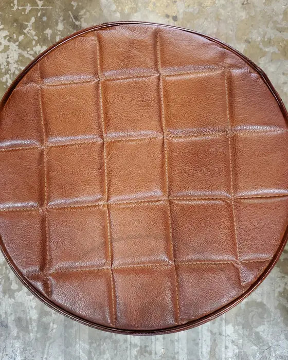 Adjustable leather counter stool with black or raw steel base