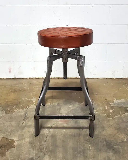 Adjustable leather counter stool with black or raw steel base