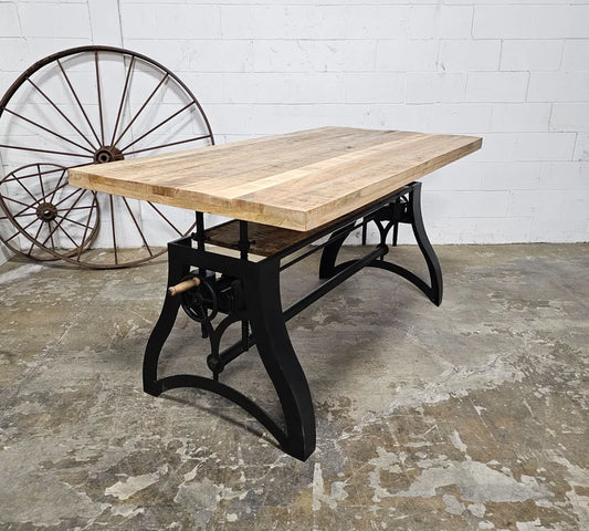 Crank dining table with matt black steel base and natural mango wood top